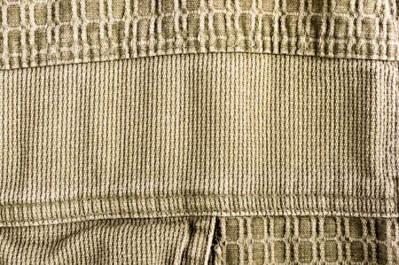 clothing items washed cotton fabric texture with seams, clasps, buttons and rivets, macro, close-upの写真素材