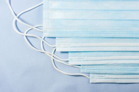 Background for news about the novel coronavirus COVID-19 - protective medical masks.の写真素材