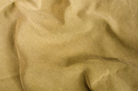 clothing items washed cotton fabric texture with seams, clasps, buttons and rivets, macro, close-upの写真素材