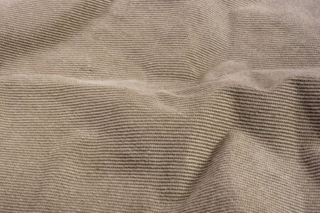 clothing items washed cotton fabric texture with seams, clasps, buttons and rivets, macro, close-upの写真素材
