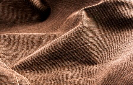 clothing items washed cotton fabric texture with seams, clasps, buttons and rivets, macro, close-upの写真素材