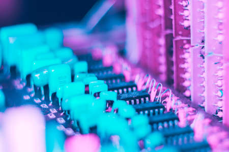Vintage electronic circuit boards with radio parts and chips, close-up, macro photographyの写真素材