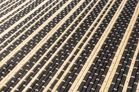 brown bamboo Mat - stand food, close-up, macro, black backgroundの写真素材