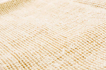 texture of light rustic coarse canvas fabric, close-up, backgroundの写真素材
