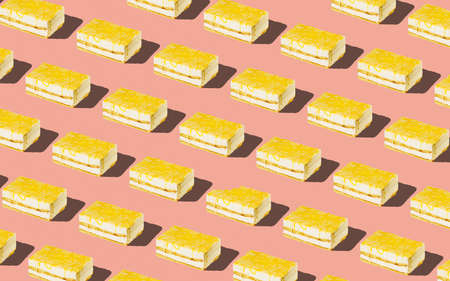 Trendy seamless food pattern - layered sponge cakes with harsh shadows on a pastel background, minimal food isometric concept texture.の写真素材