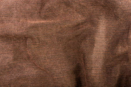 clothing items washed cotton fabric texture with seams, clasps, buttons and rivets, macro, close-upの写真素材