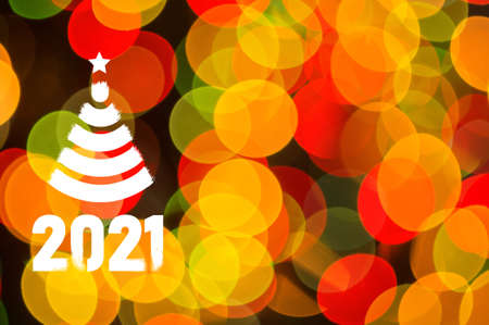 Christmas background-garlands with colorful lights on a decorated Christmas tree, bokeh, Happy New...