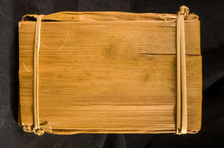 Chinese pressed PU-erh tea in bamboo leaf packaging, close-upの写真素材