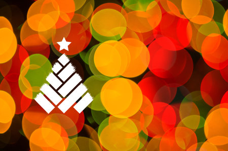 Christmas background-garlands with colorful lights on a decorated Christmas tree, bokeh, Happy New Year 2021 colored symbol and text in trendy flatten style design for seasonal holidays flyers, greetings and invitations cards and christmas themed congratulations and bannersの写真素材