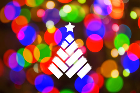 Christmas background-garlands with colorful lights on a decorated Christmas tree, bokeh, Happy New Year 2021 colored symbol and text in trendy flatten style design for seasonal holidays flyers, greetings and invitations cards and christmas themed congratulations and bannersの写真素材