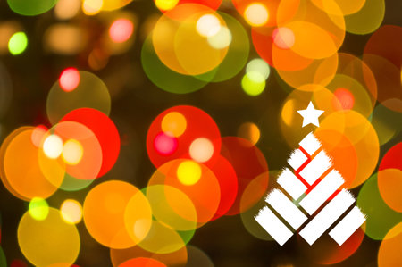 Christmas background-garlands with colorful lights on a decorated Christmas tree, bokeh, Happy New Year 2021 colored symbol and text in trendy flatten style design for seasonal holidays flyers, greetings and invitations cards and christmas themed congratulations and bannersの写真素材