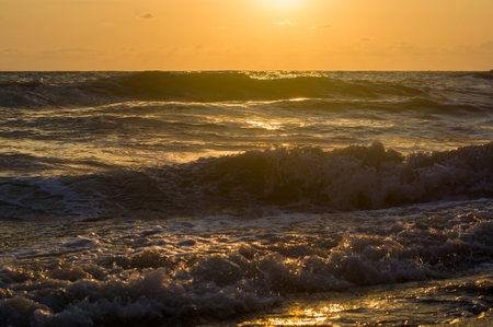 Amazing sea sunset, the sun, waves, cloudsの写真素材