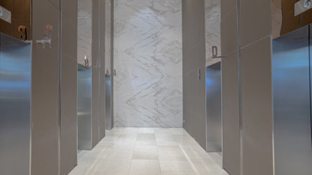 Modern steel elevator cabins in a business lobby or Hotel, Store, interior, office,perspective wide...