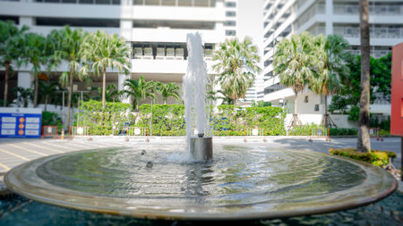The fountains that are rising in the center of the image on the sides and behind the image will melt will be pronounced only in the middle of the picture The fountain in the daytimの写真素材