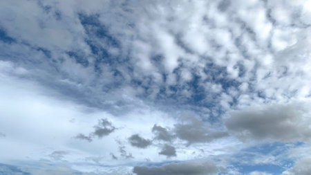 bright sky white misty clouds forming shapes