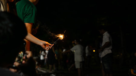 Atmosphere photos In the midst of the darkness at night, there were a lot of people. The...