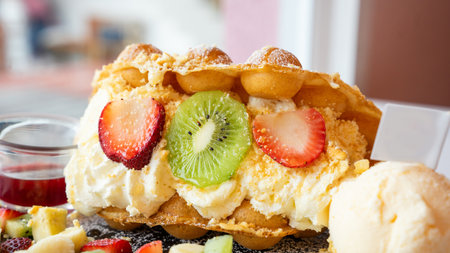 Bread stuffed with sweet ice cream Contains citrus fruits as additional ingredients. Dessert menu, close-up focus, clearly see the layers of desserts Suitable for use as a backgrouの写真素材