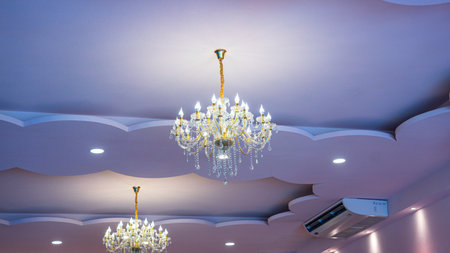Picture of chandeliers Hanging from the ceiling of the banquet hall were two lanterns, which were...