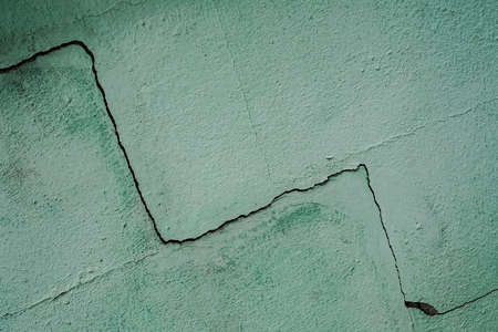 Dark old cement dirty with green paint . rupture wall texture abstract background. copy space you can add text or products for presentation.の写真素材