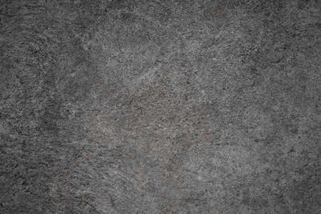 Dark cement black and white background. dirty old wall texture abstract.の写真素材
