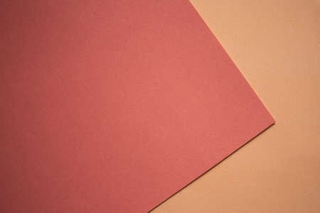 Red and orange paper backgrond. flat lay with copy space. can add text or products about summer or sweet love valentine days for presentation.の写真素材
