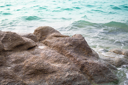 Soft wave on blue ocean on rock at coast.  wonderful nature sea in pattaya thailand. travel summer holidays concept.の写真素材