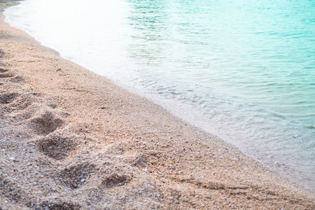 Sea soft wave on sandy beach at coast. beautiful blue ocean outdoor nature landscape  background. tourist summer travel holidays concept.の写真素材