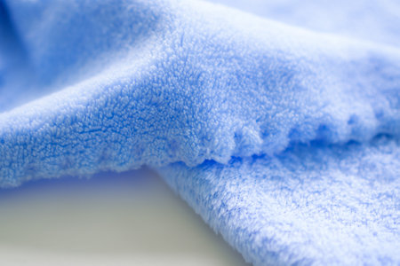 Purple blue towel background. wave soft fabric. new modern design luxurious light and soft wave smooth shape silk wallpaper. free space. for card poster or presentation products concept.の写真素材