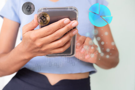 Woman use mobile smartphone with icon bitcoin crypto currency, graph Pie chart market share competition,candlestick, cash dollars symbols.plan investment forext trade stock market. business finance.の写真素材