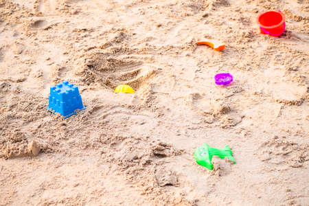 Toy on sand beach at coast for children. tourist in vacation travel summer holidays. happy family...