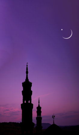 Ramadan, Eid ai-fitr,New year Muharram islamic religion Symbols with Moon silhouette on blur dark red and orange twilight sky in night sunset. arabic,Eid al-adha,mubarak  Muslim concept.の写真素材