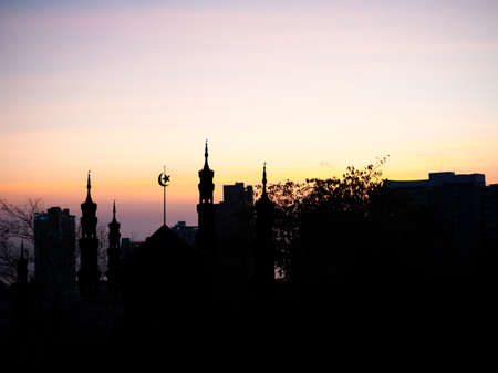 Ramadan, Eid ai-fitr,New year Muharram islamic religion Symbols with Mosques Dome silhouette on dark red and twilight sky in night sunset. arabic,Eid al-adha,mubarak  Muslim concept.の写真素材