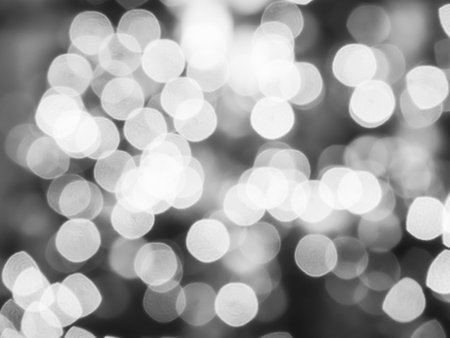 Light Night Bokeh dark Black Background,Abstract Gray Black and White Circle Effect Sparkle Blurry Backdrop,for Invitation Special Gala,Birthday Card,Christmas Holidays Celebration,Happy New Year 2023の写真素材