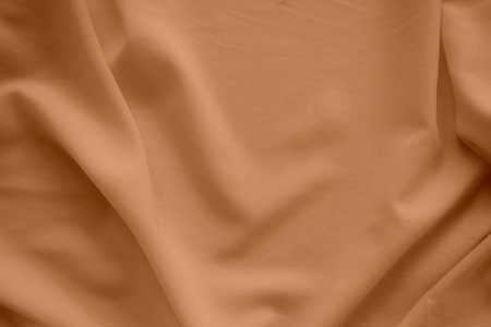 Orange Color Autumn Cloth Pattern Background,Silk Wave Texture Design Backdrop,Card Poster or Banner,Light Gradient Fabric Smooth Shape Colorful,Abstract Luxury Golden Template Wallpaper,free space.の写真素材
