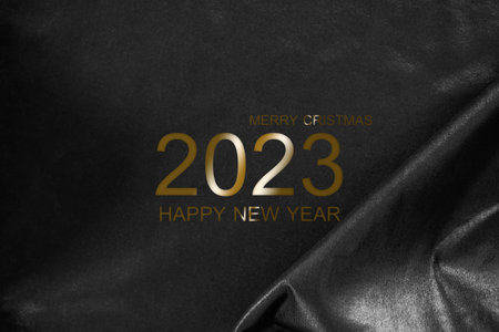 2023 Happy New Year on Dark Black Fabric Background,Card or Poster Celebration Festive Christmas New Start Backdrop,Free Space Mock Up Display for add Product and Company Presentation.Party Symbols.の写真素材