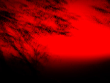 Halloween background Concept,Blur Abstract Sunset on Dark Black and Red Background.