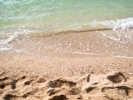 Texture Wave Water Blue Sea at Coast on Sand Beach Background,Ocean Island Clouds Horizon Nature Landscape,Calm water in Morning,à¸ºTourism Tropical travel Shore in Holidays concept.の写真素材