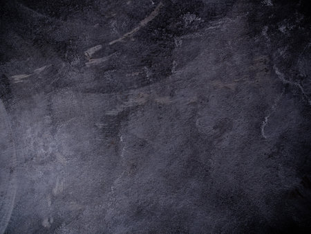 Gray Cement Wall Dark Black Background,Texture Surface Grey Paint Dark Black Material Structure Construction Backdrop,Interior Raw Room Studio Mock up Display,Empty Free Space for Presentation conceptの写真素材