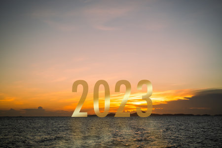 2023 Happy New Year on Sea Sunset Background,Card or Poster Celebration Festive Christmas New Start...