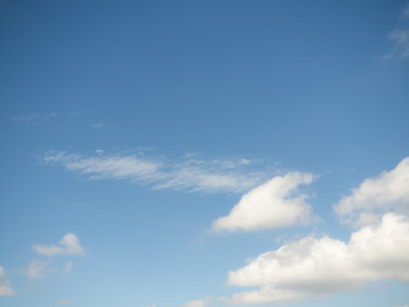 Blue Sky white Cloud Background, Sunlight Day with Sky Wallpaper Backdrop,Mockup Nature Landscape Free Space Backdrop,Card or Poster for Environment Protection.の写真素材
