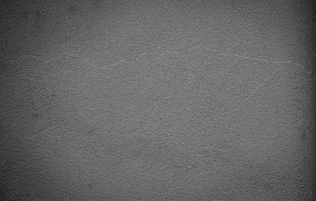 Gray Cement Wall Background,Texture Surface Grey Paint Dark Black Material Buiding Structure Construction Backdrop,Interior Raw Room Studio Mock up Display,Empty Free Space for Products Presentation.の写真素材