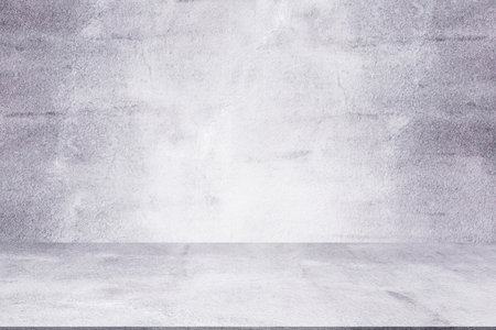 Empty studio room gray cement background. blank table old grunge surface concreet construction backdrop. counter shelf mortar display material. free space for add text or products presentation.の写真素材