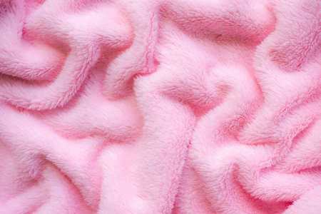 Pink towel background. wave soft fabric. new modern design luxurious light and soft wave smooth shape silk wallpaper. free space. for card poster or presentation products concept.の写真素材