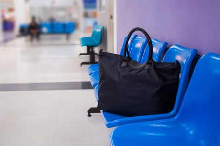 Black Luggage on chair in transport station. tourism travel holidays concept.の写真素材
