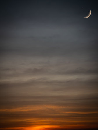 Mubarak Ramadan Month Muslim Islamic Moon Symbols,Crescent Moon and Star on Night Sky Dusk Orange Pink Blue Evening Background,Twilight Free Space for Eid Al Adha,Eid Al Firr,Muharram Religious.の写真素材