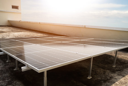 Technology Light Solar Panels Solar Cells on Rooftop with Sun Overlight Day no House Building with...