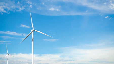 Windmill on Blue Sky,Energy Turbine Wind Farm Generation Factory Farm,Plant Wind Turbine Power Sustainable Factory,Electric Industrial Alternative Renewable Energy Technology Mill,Environment.の写真素材