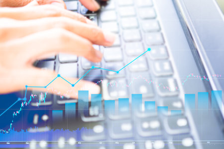 Finger Typing Keyboard with Growth Cancle Stick Graph Chart Trade Forex,Business Technology Digital Money Future Global Marketing,Stock Market finance Internet Market.の写真素材