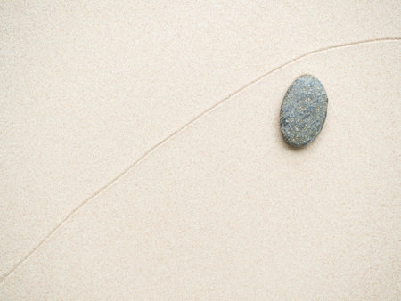 Zen Stone Garden on Sand Background Top View,Japanese Circle Rock on Texture Pattern White Gray Beach Harmony Spa Balance,Abstract Japan Peace Scene Nature Relax Wellness,Pebble Buddhism Traditional.の写真素材