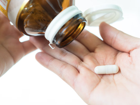 Supplement Vitamin Food Pill Nutrition Medicine Antioxidant Medical Natural,Energy Herbal Drug Detox Herbs,Royal jelly capsules on Palm up,Food for Good Health concept.の写真素材